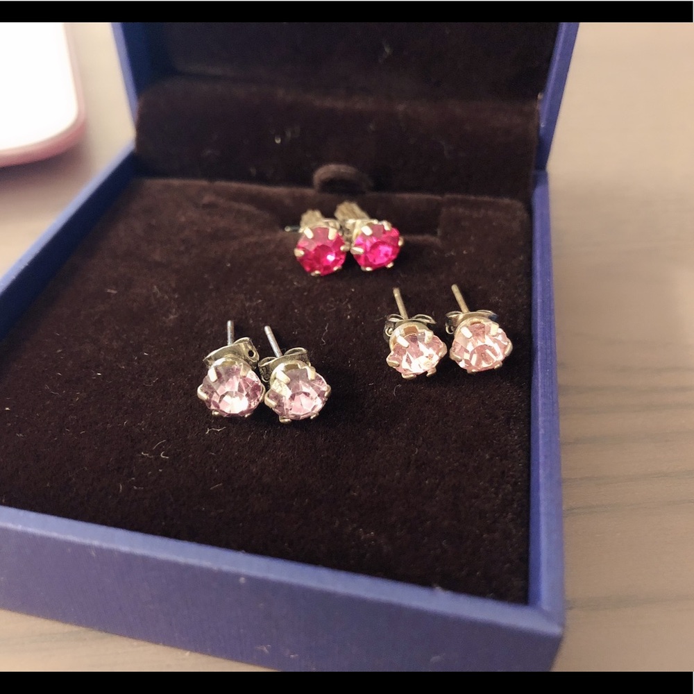 Three pairs of pinky crystal ear studs